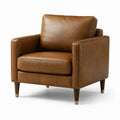 Sillón de cuero sintético marrón con patas de madera
