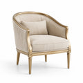 Sillón redondo dorado con tapizado de lino
