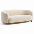 Sofá curvo de tela bouclé beige con base de madera de 220 cm